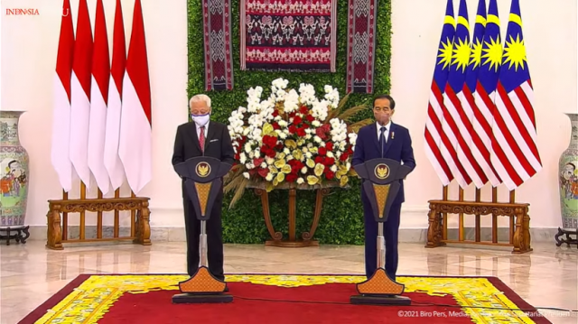 20211111 Bertemu PM Malaysia Presiden Jokowi Dorong Penyelesaian MoU Perlindungan TKI dan Negosiasi Batas Negara